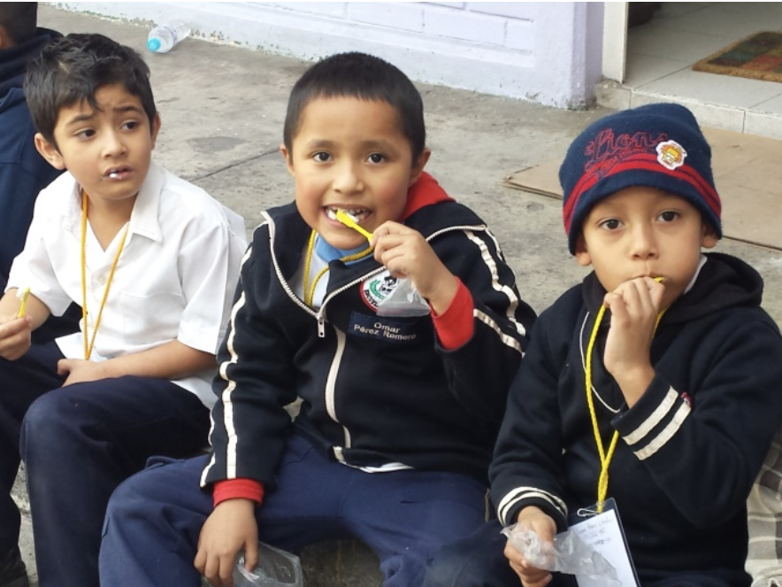 Children in Mexico brushing their teeth